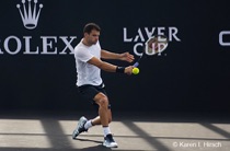 Grigor Dmitrov returning the ball